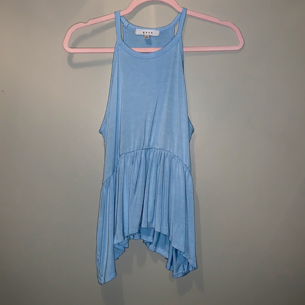Selling a flowy tank top has been worn only once and in new condition.